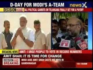 Narendra Modi clicks a selfie after voting