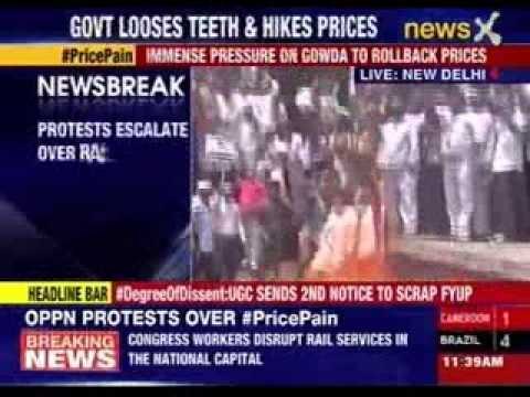 Congress workers protest against hike in rail fares in Delhi