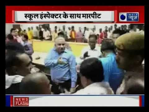 Uttar Pradesh: BJP MLA Surendra Singh pushes District School Inspector in meeting at Ballia