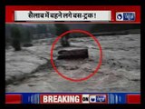 Manali highway blocked, Tourist bus gets washed away by Flooded River  near  Himachal Pradesh