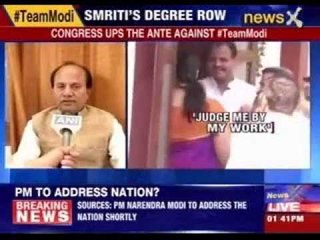 Smriti Irani hits back says 'judge me by my work'