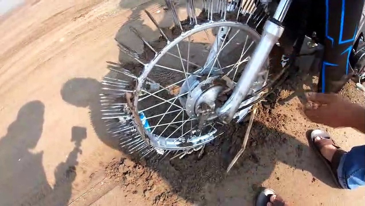 NTN - Thử Đi Xe Máy Bánh Gắn Đinh (Ride motorbike on Nails)