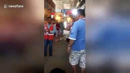 Pomeranian cools off in fridge during heatwave in Thailand