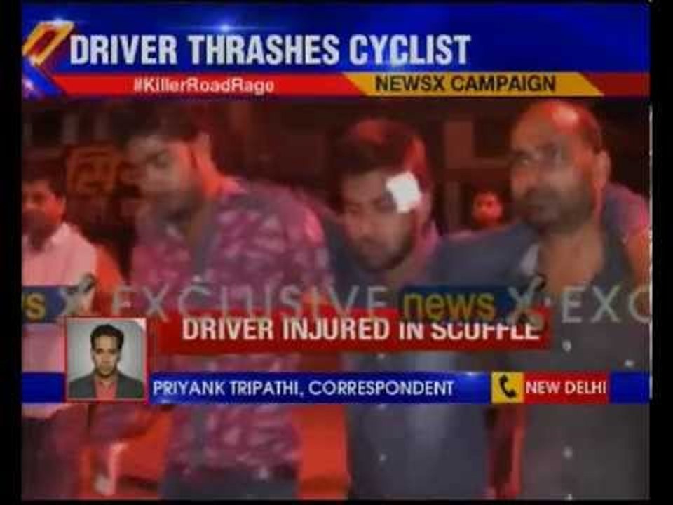 Car driver thrashes a cyclist