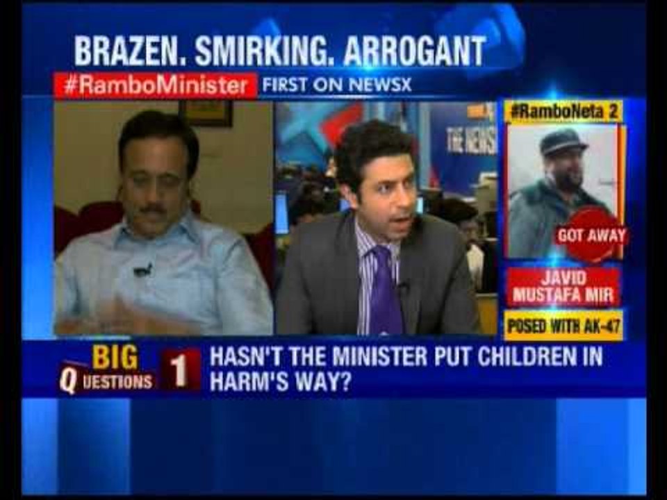 Smoking! Revolver tucked under belt, Maharashtra minister addresses children