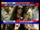 Shiv Sena activists protest against writer Shobhaa De outside her residence
