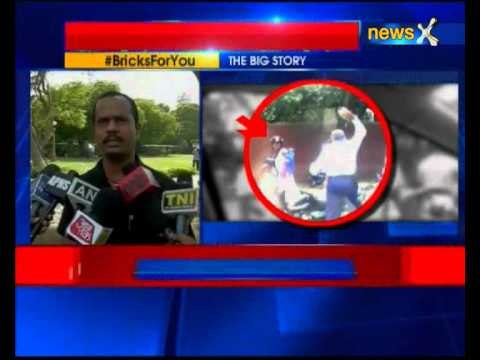 Delhi cop caught on camera attacking woman with brick, sacked and arrested