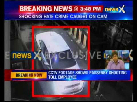 CCTV footage shows passerby shooting toll employee