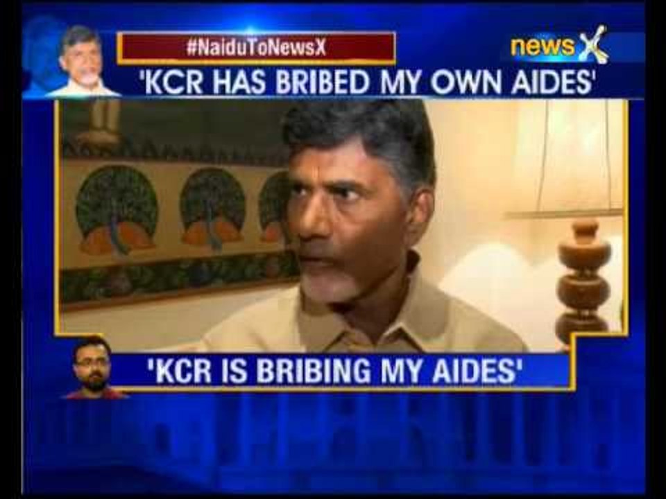 KCR is bribing my aides and tapping my phones,...