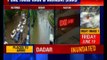 Heavy rain halts Mumbai, 2 killed; rail commuters hit hard