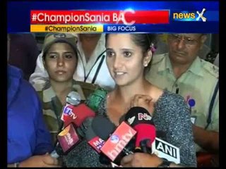 Women's Doubles Champion Sania Mirza reaches home with Wimbledon trophy