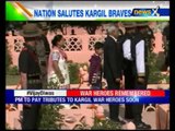 Families of martyrs lay wreath at the memorial