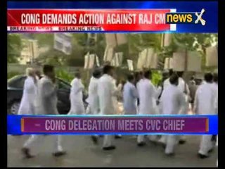 Congress leaders seek action against Raje