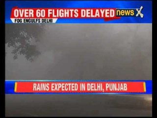 Tải video: Visibility goes down as heavy fog covers Delhi, 60 flights and over 130 trains delayed