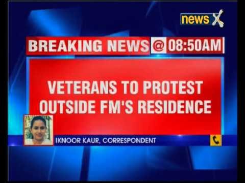 Ex-servicemen protest outside Finance Minister Arun Jaitley's residence
