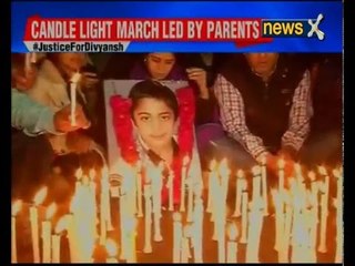 Divyansh's parents hold candle light march in Delhi