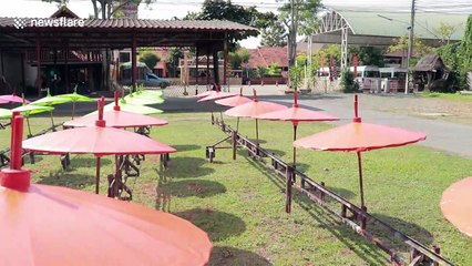 Inside the workshop where beautiful silk umbrellas are made by hand