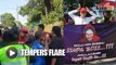 BN, Harapan supporters clash over 'Rosmah the boss' banner
