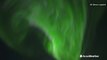 Northern Lights dance across the night sky in Finland
