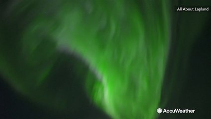 Northern Lights dance across the night sky in Finland