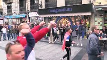 Ajax fans cheer and chant en route to stadium before Real Madrid knocked out
