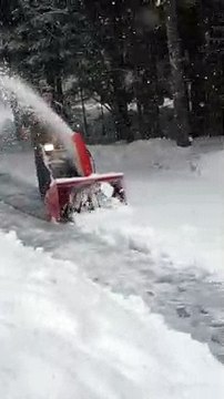 Man Busts a Moves While Plowing Snow