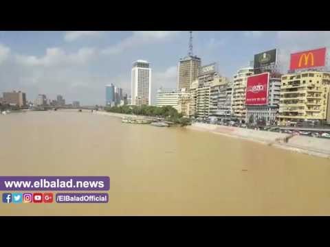 صدى البلد |مياه النيل تتحول للون الاصفر .. ومواطنون يلتقطون سيلفى معه