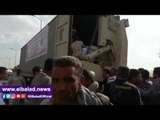صدى البلد |القوات المسلحة أثناء توزيعها عبوات غذائية بميدان 