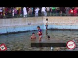 اتفرج| استحمام الاطفال بنافورة ميدان مصطفي محمود