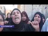 والدة شهيد سيناء بالدقهلية تقود مسيرة أمام مقبرته بهتاف 