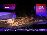 فنان مصرى يجسد احداث الثورة باستخدام الرمال