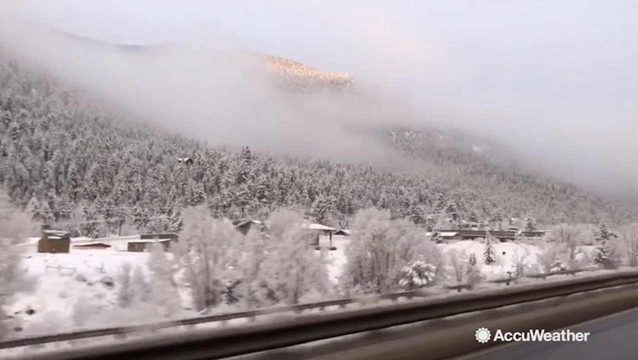 Beautiful scene as sun rises over mountains after fresh snow