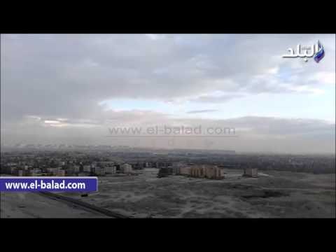 عاصفة ترابية تجتاح قلب القاهرة وسقوط أمطار خفيفة
