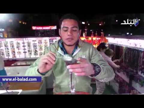 صدى البلد | فنان الرسم بالرمال يرصد احوال السياحة بشرم الشيخ فى زجاجة رمل