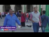 صدى البلد |الباعة الجائلون يحتلون محيط مجمع التحرير