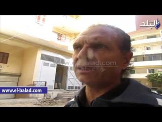 صدى البلد | برج  سكنى بالفيوم يهدد عقارين بالأنهيار