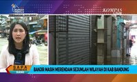 Permukiman Terendam Banjir, Warga Dayeuh Kolot Gunakan Perahu