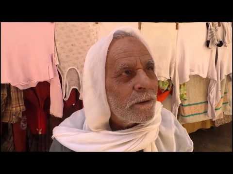 صدى البلد | أهالى كفر طهرمس بفيصل يشكون الانقطاع المستمر للمياه وانتشار القمامة