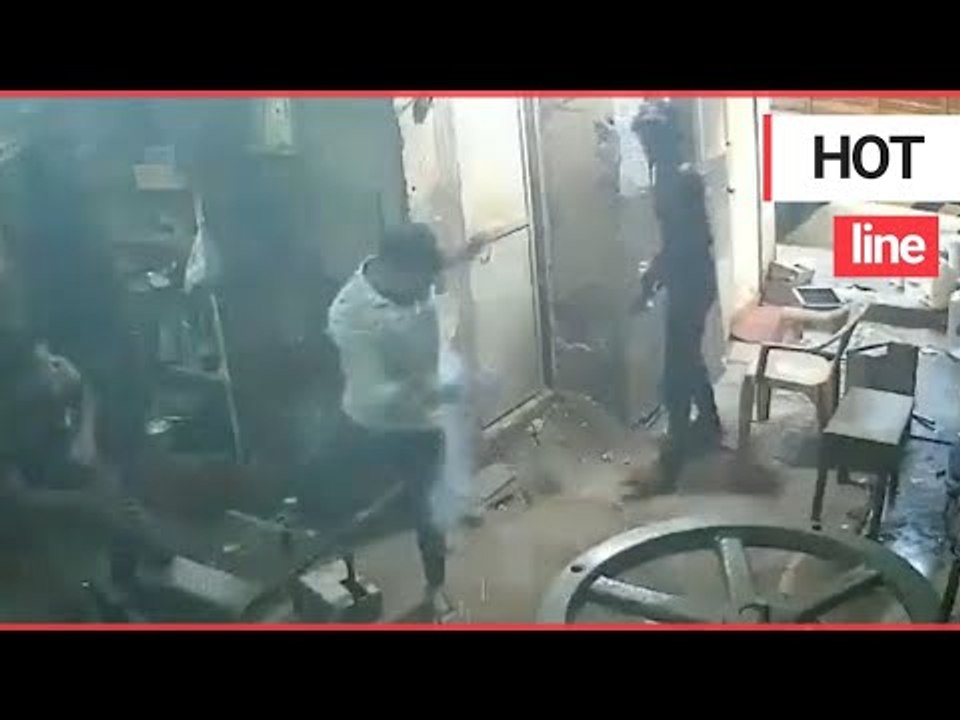 Moment worker's phone explodes in his pocket leaving him with burns | SWNS TV