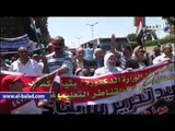 صدى البلد |مواطنون يرفعون أعلام مصر بميدان مصطفى محمود احتفالا بتحرير سيناء