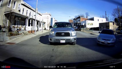 Man Chucks Drink at Car after Driving Incident