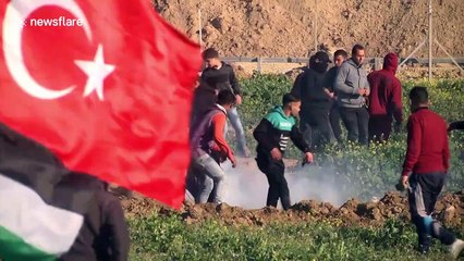 Palestinian youths stretchered into ambulances in latest Gaza cross-border violence