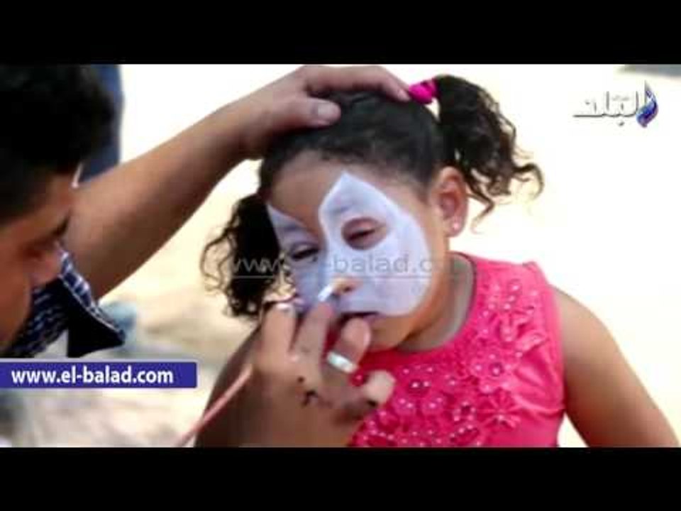 صدى البلد | الأطفال يرسمون وجوههم داخل حديقة الحيوان