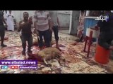 صدى البلد | مواطنو الدقهلية يذبحون الأضحية احتفالا بالعيد
