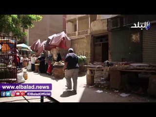 صدى البلد | شارع دويدار بحدائق القبة يقع فريسة للإشغالات والمحافظة نايمة