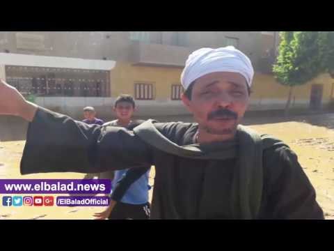 صدى البلد |الحاج علي فهمي يروي معاناته مع السيول أمام منزله المحاصر بالمياه بقرية الحاجر