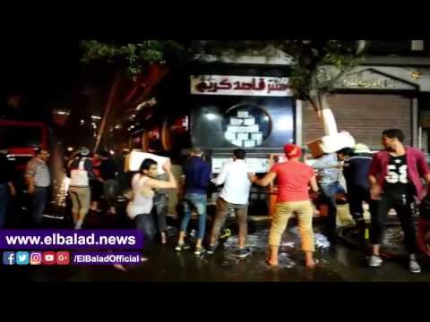 صدى البلد | اخلاء المحال التجارية من محيط حريق الفجالة