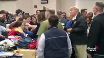 Donald Trump Signs Bible After Alabama Tornadoes