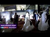 صدى البلد | حفل زفاف جماعي لـ20 عروسًا في نادي مدينة نصر