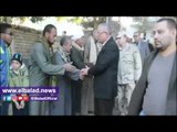صدى البلد | محافظ المنيا يقدم العزاء لأسر شهيدي الجيش فى ملوي